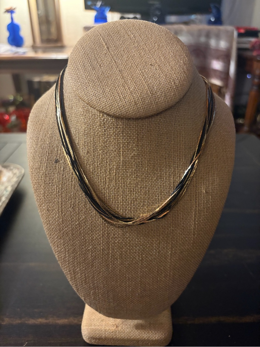 Gold and black multistrand necklace